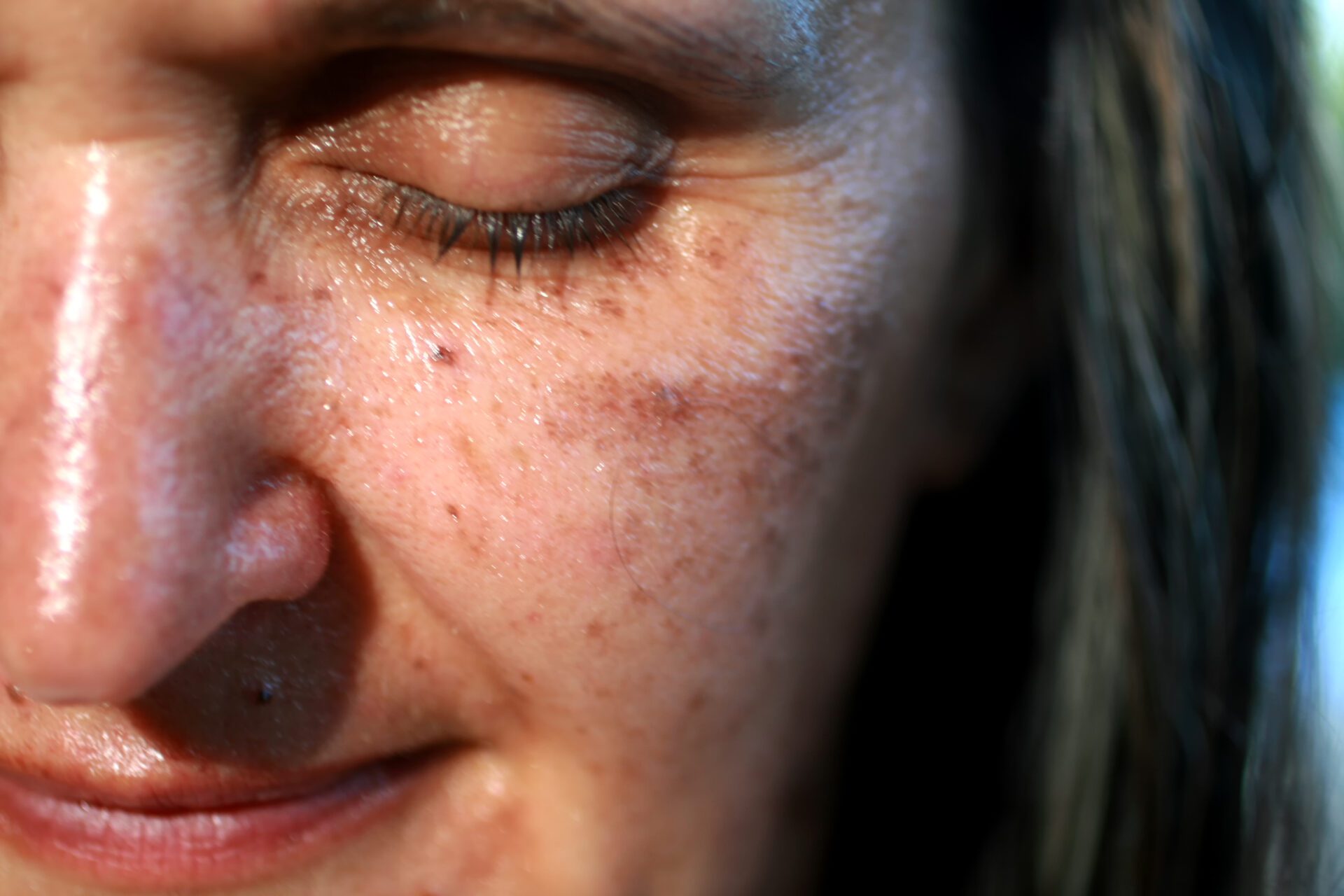 A woman with a lot of cream on her face