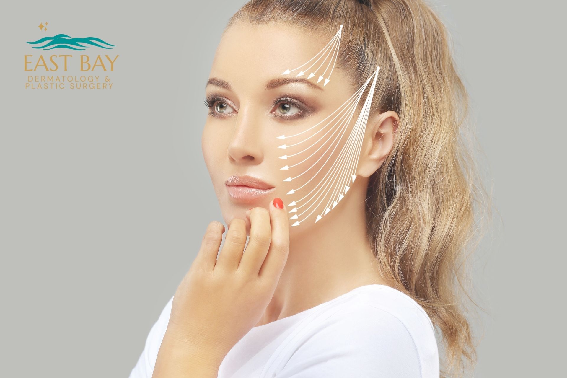A woman touches her face as white arrows illustrate potential facial lifting directions. East Bay Dermatology & Plastic Surgery logo is in the upper left corner.